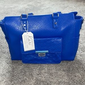 Brand New w/ tags Damsel in Defense Concealed Kari Bag!